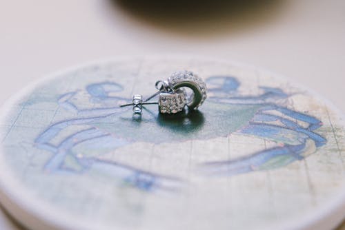 Close-up of Earrings on Table