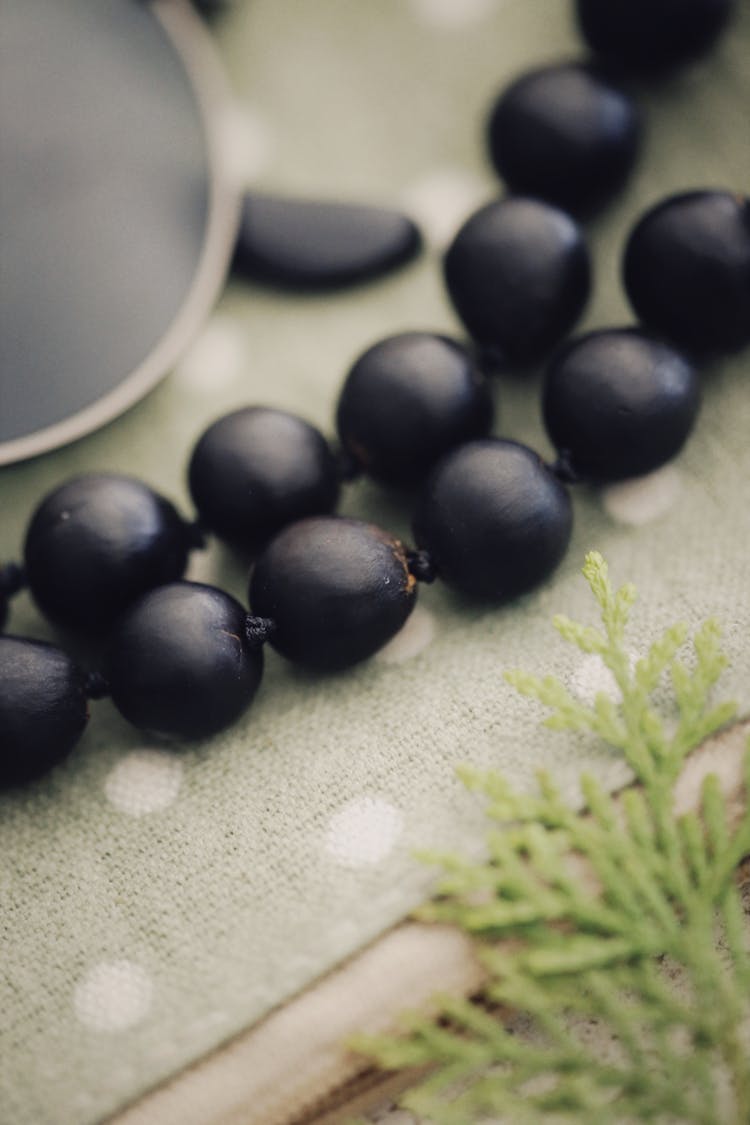 Close-up Of String Of Black Beads 