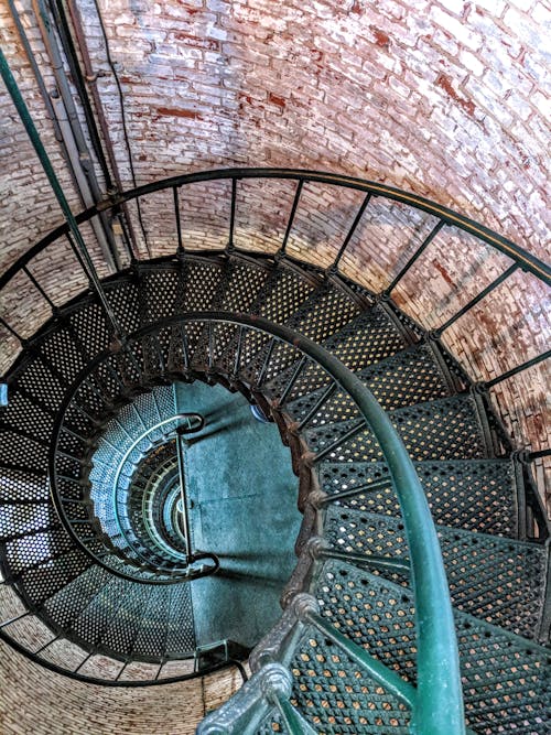 Free Top View of Green Metal Spiral Staircase Stock Photo