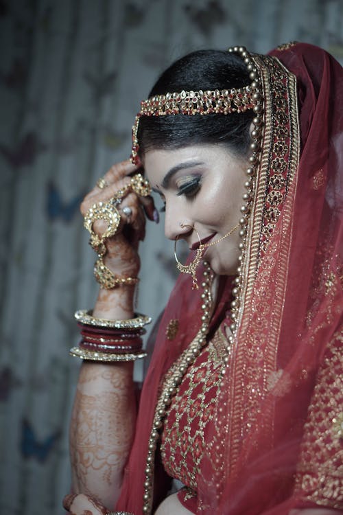 Free Photograph of a Bride with a Red Veil Stock Photo