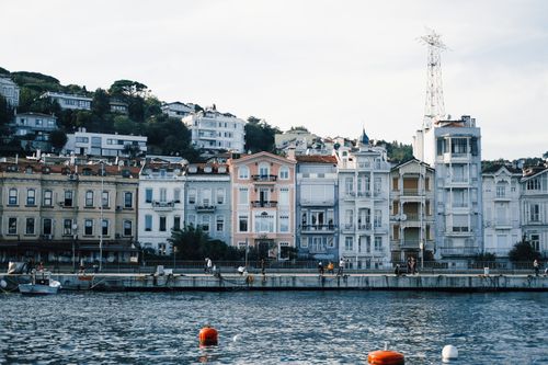 Free Charming historical waterfront houses along Istanbul's Bosphorus on a sunny day. Stock Photo