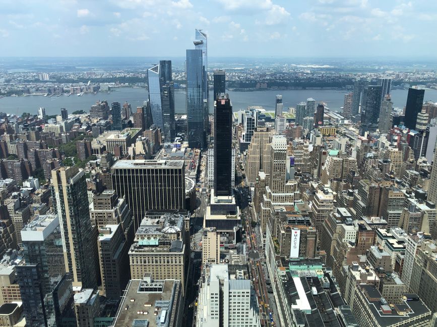 Breathtaking The Manhattan Helicopter Tour of New York Review: A 12-Minute NYC Adventure Review 2026 - An aerial view showcasing the dense skyscraper landscape of New York City on a clear day.
