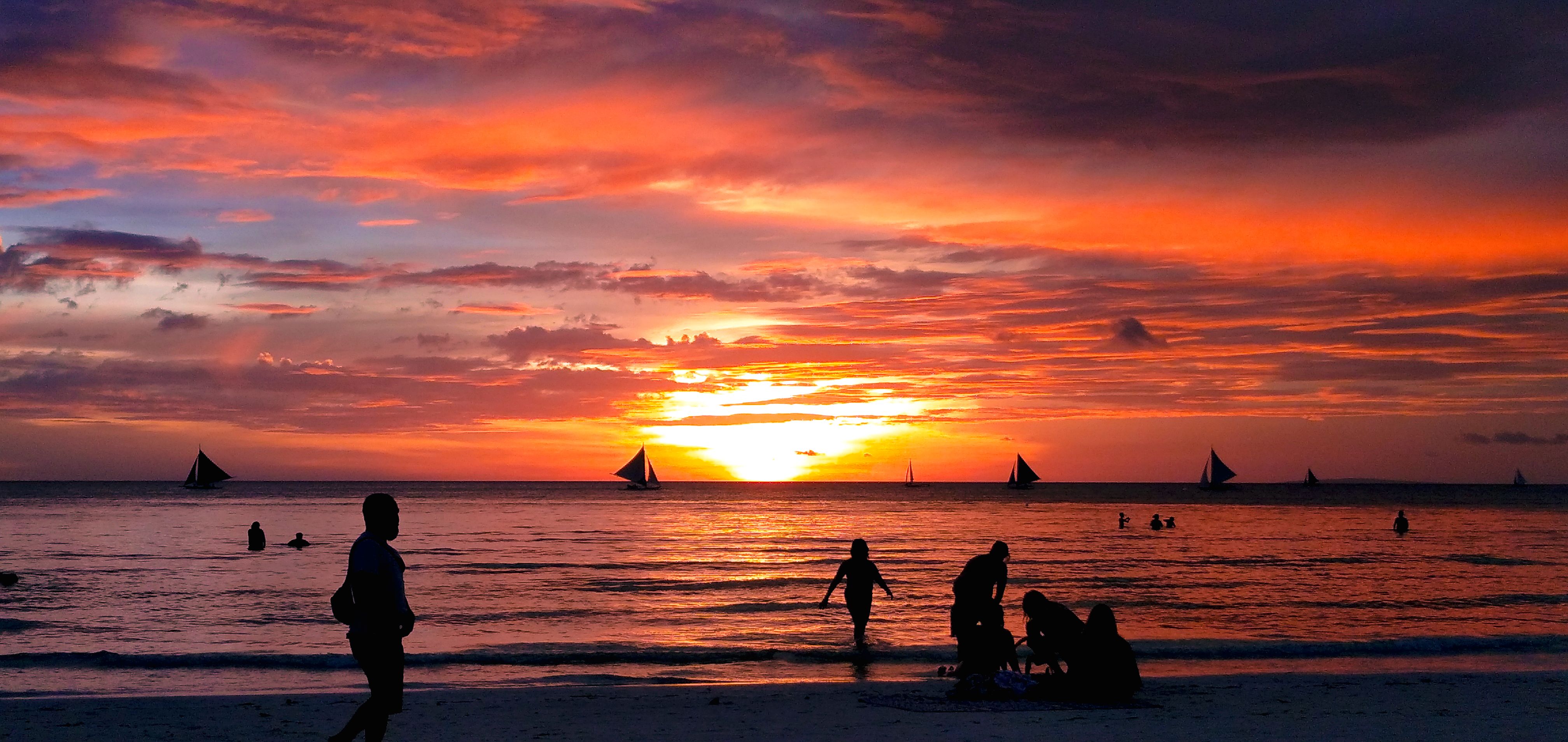 Silhouette of People on Beach during Sunset · Free Stock Photo