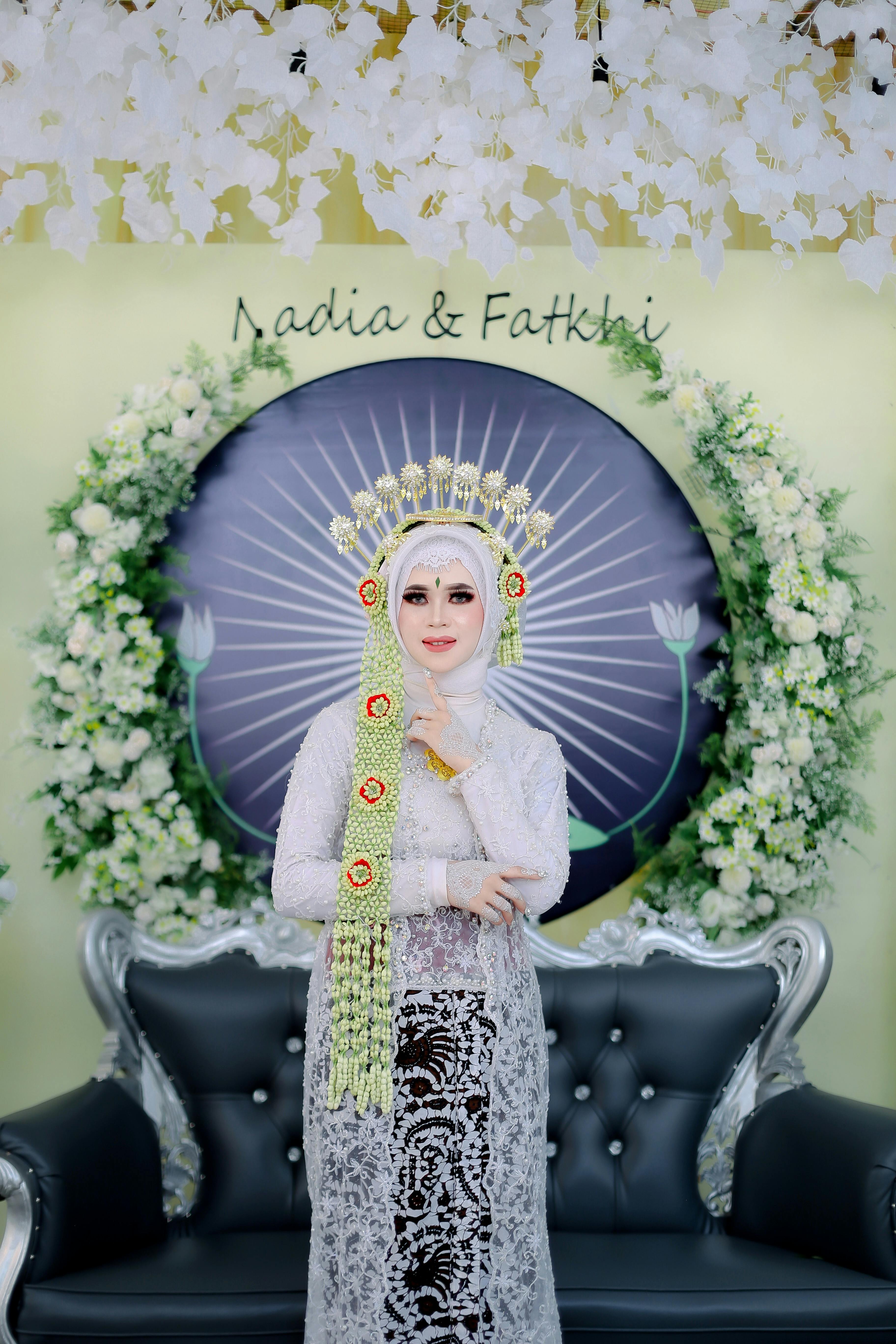 Beautiful Woman Wearing a Hijab and a White Dress · Free Stock Photo