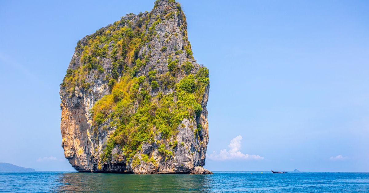 Four Islands tour longtail boats at Koh Poda beach Krabi Thailand