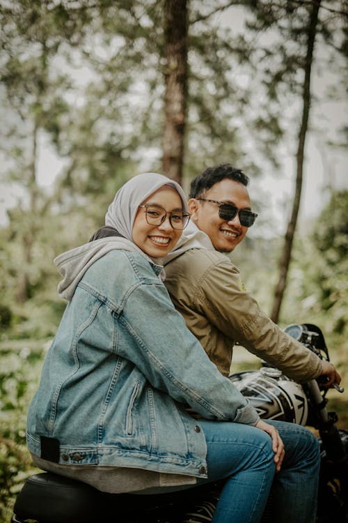 Smiling Couple on Motorcycle