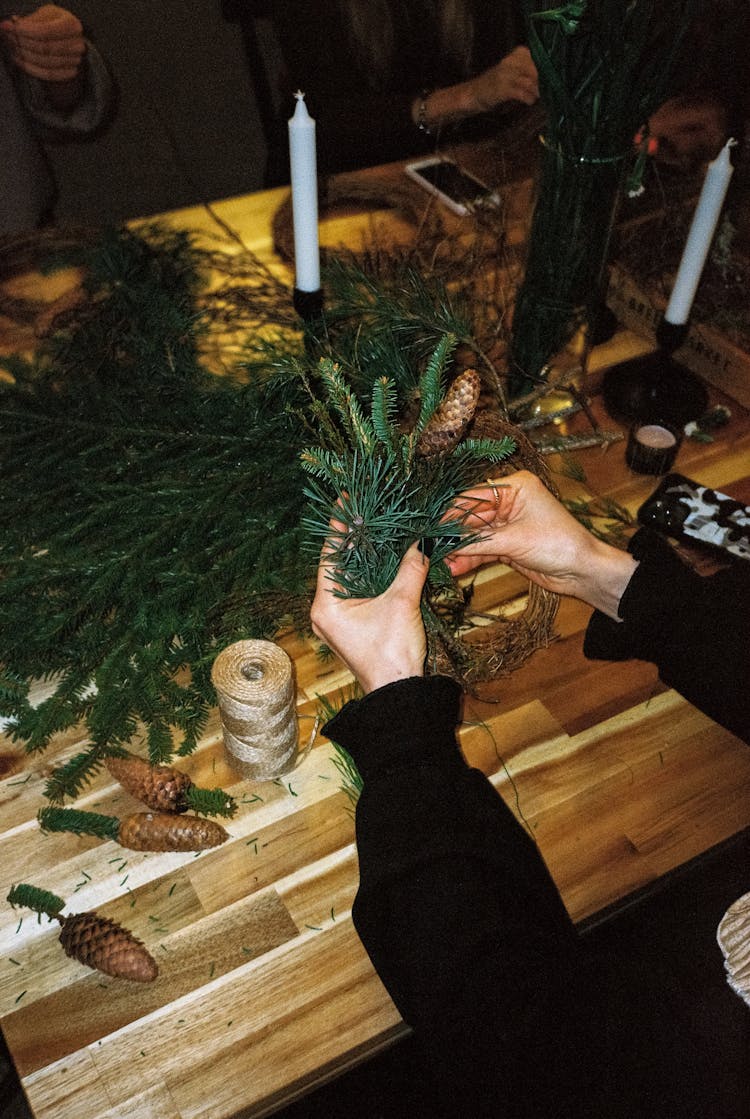 Woman Making Christmas Wreaths 