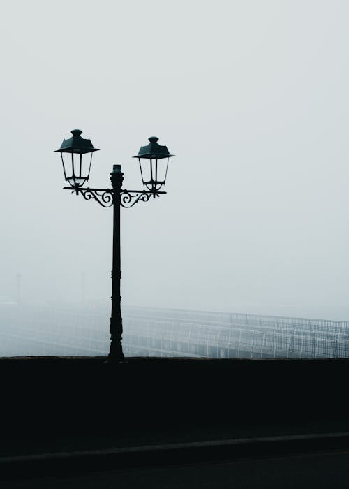 Photograph of a Street Lamp on a Foggy Weather