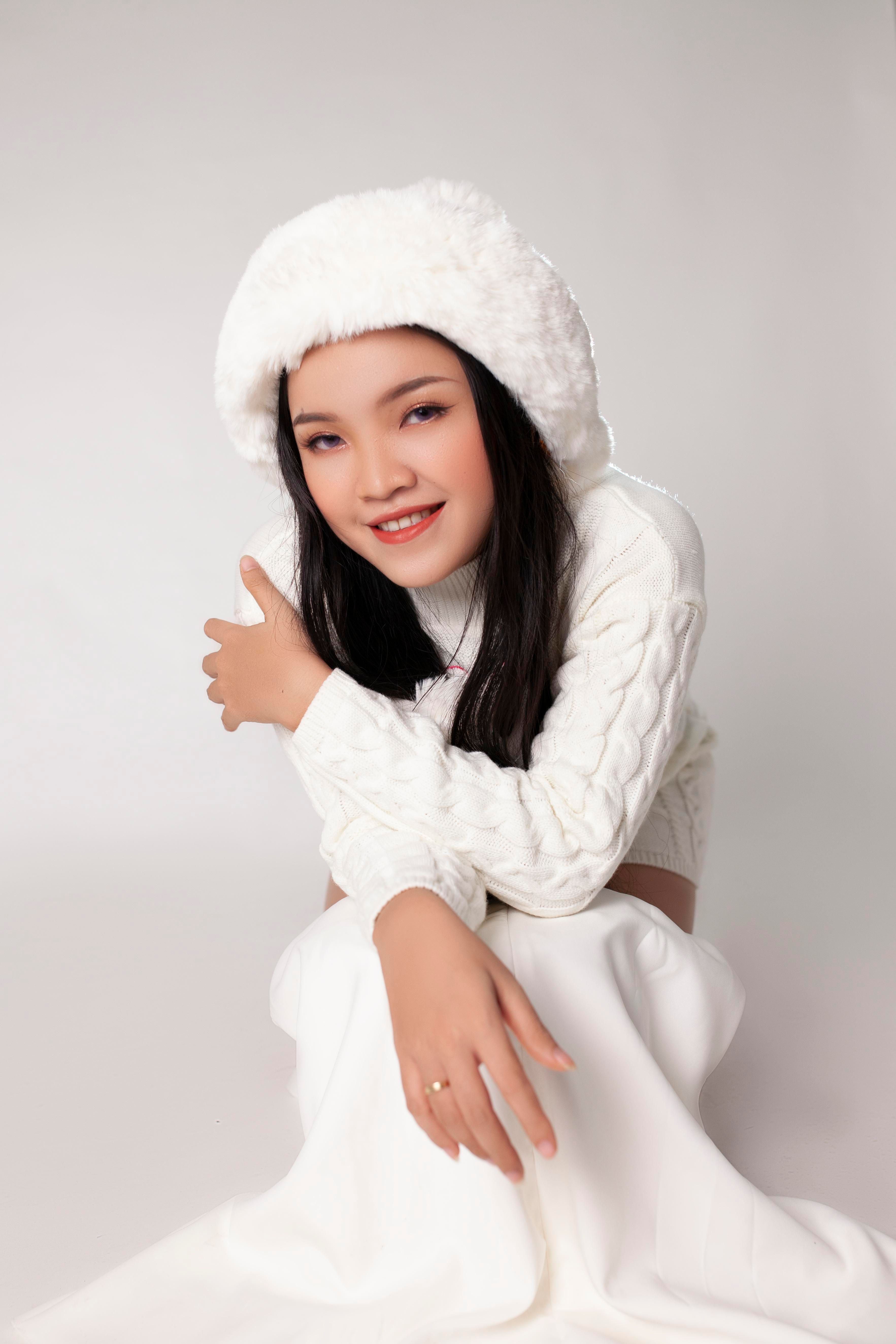 Photograph of a Woman in White Clothes Looking at the Camera · Free ...