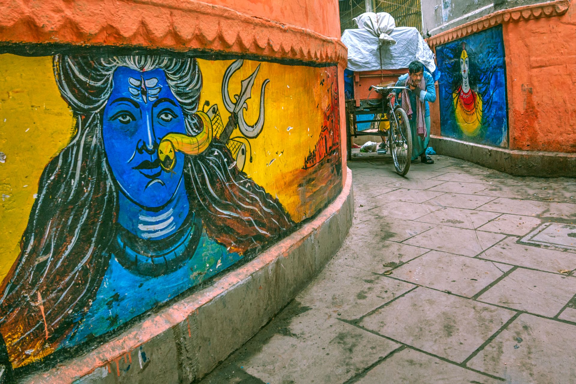 Colorful street murals in Varanasi, capturing the vibrant local culture.