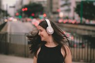 Shallow Focus of a Woman Listening to Music