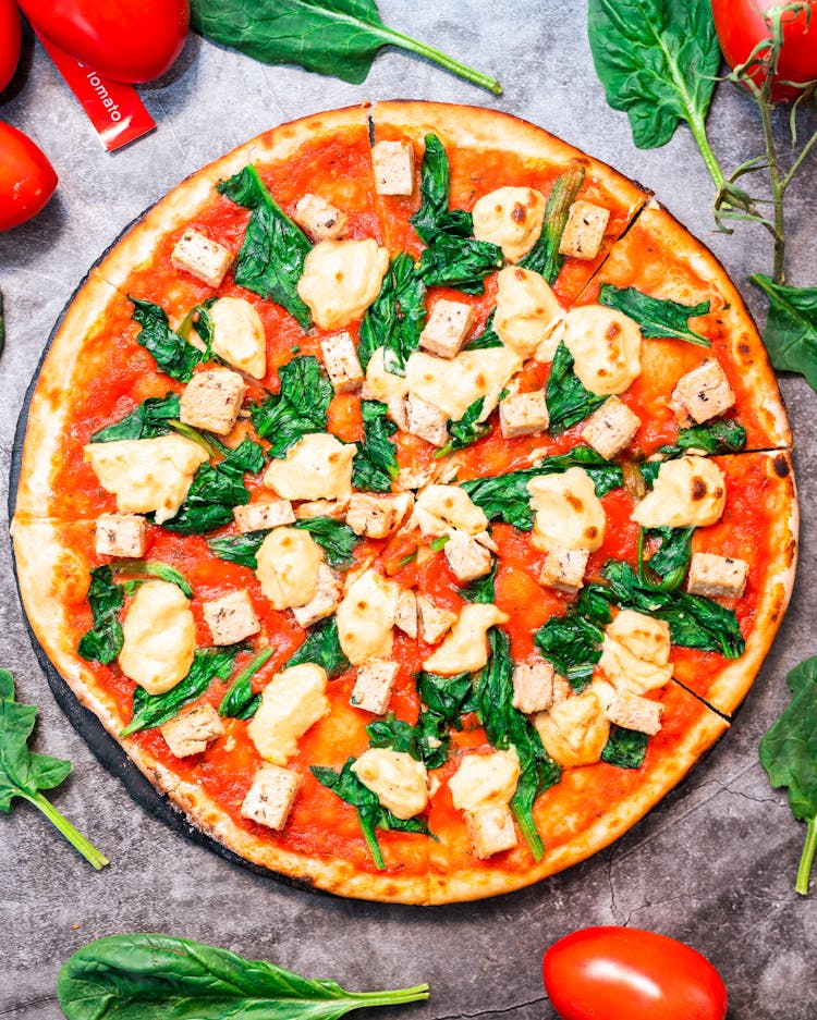 Fresh Pizza With Tomatoes And Basil