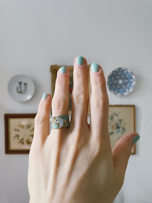 Handmade Ring with Bird on Womans Hand 