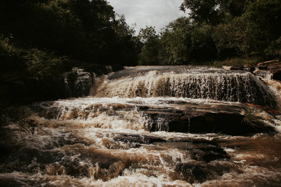 Outstanding Taste of the Amazon Jungle 3D-2N-A Amazon Tapiri Floating Lodge Review 2026 - Beautiful waterfall in Piracanjuba's lush forest landscape, capturing nature's power.