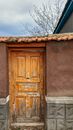 Wooden Door on Concrete Wall