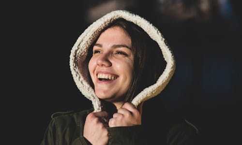 Free Smiling Woman in Green and White Jacket Stock Photo