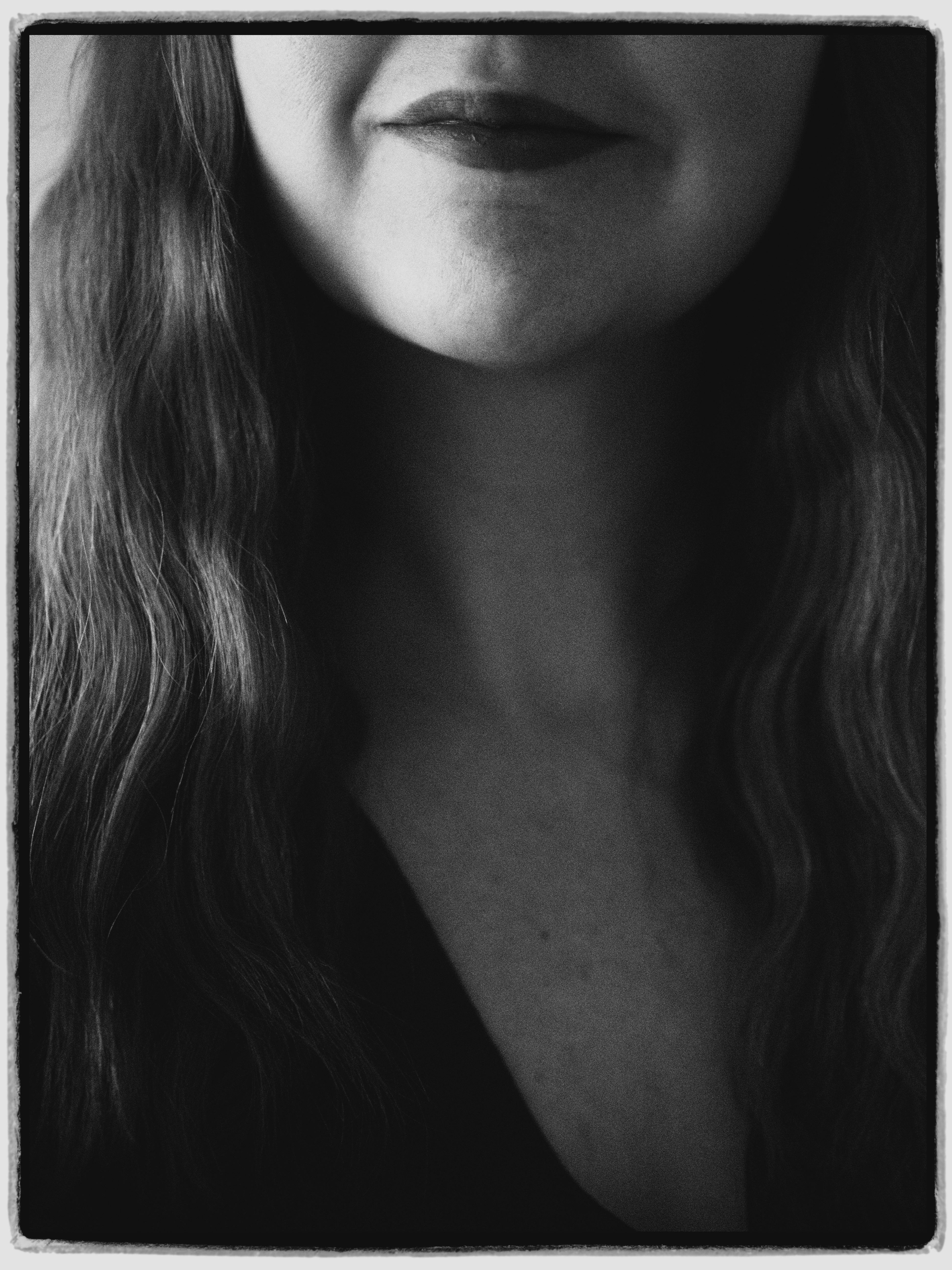 close up shot of a woman with curly hair