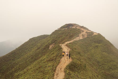 Drone Shot of Hikers Walking on the Mountain