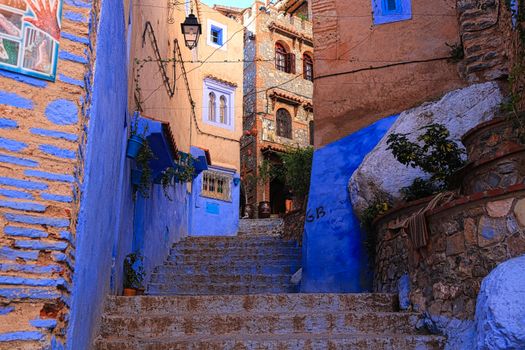 Blue alleys at dawn with a photographer — Chefchaouen