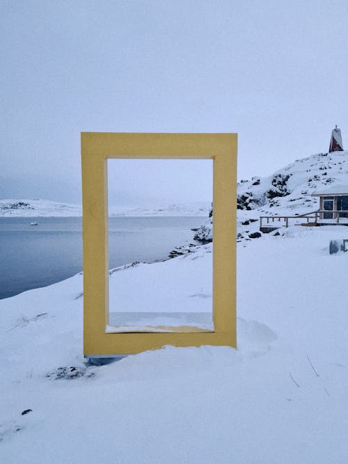 Snow Covered Coastal Area with Concrete Structure