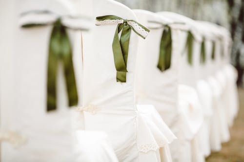 Selective Focus Photography of White Padded Chair