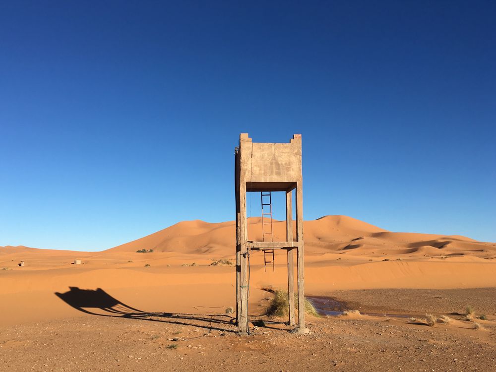 A Concrete Structure on the Dry Sand · Free Stock Photo
