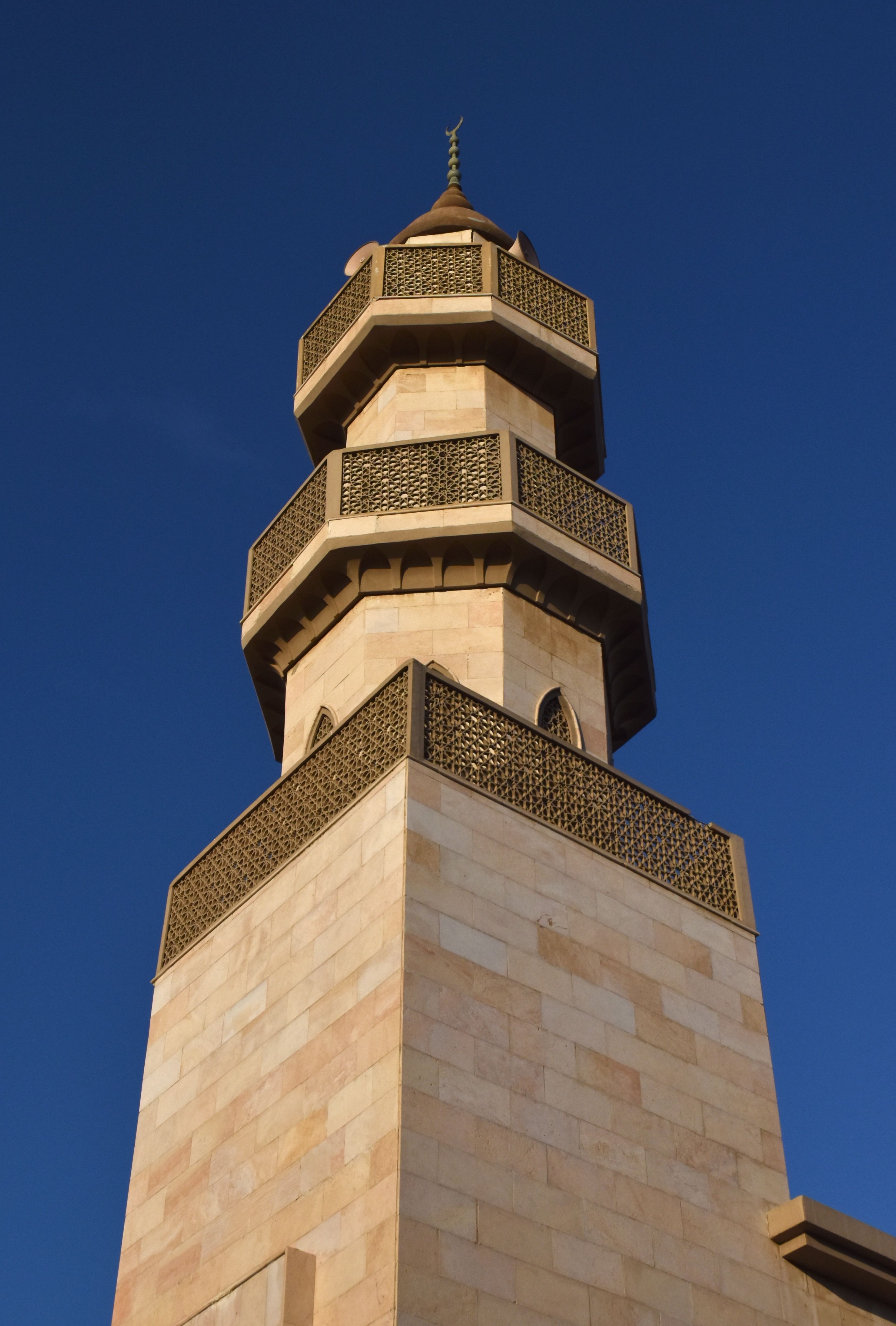 A Concrete Tower Under the Blue Sky · Free Stock Photo
