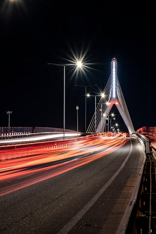 Time Lapse Photo of Fast Moving Cars on the Road