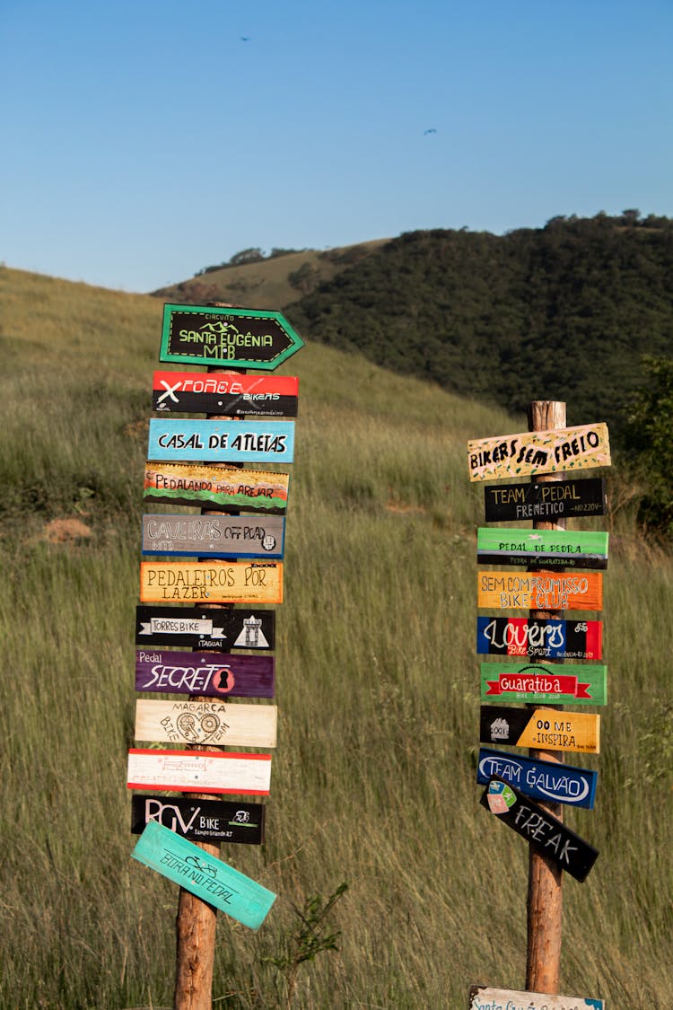 Wooden Signages On A Wooden Boards