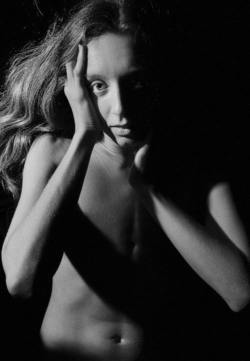 Grayscale Photo of Topless Woman