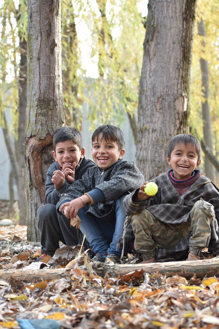Joyful group of children outdoors on an autumn day — photo by Hurrah suhail on Pexels