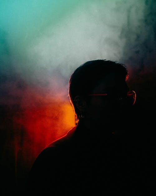 Silhouette of a Person Wearing Eyeglasses