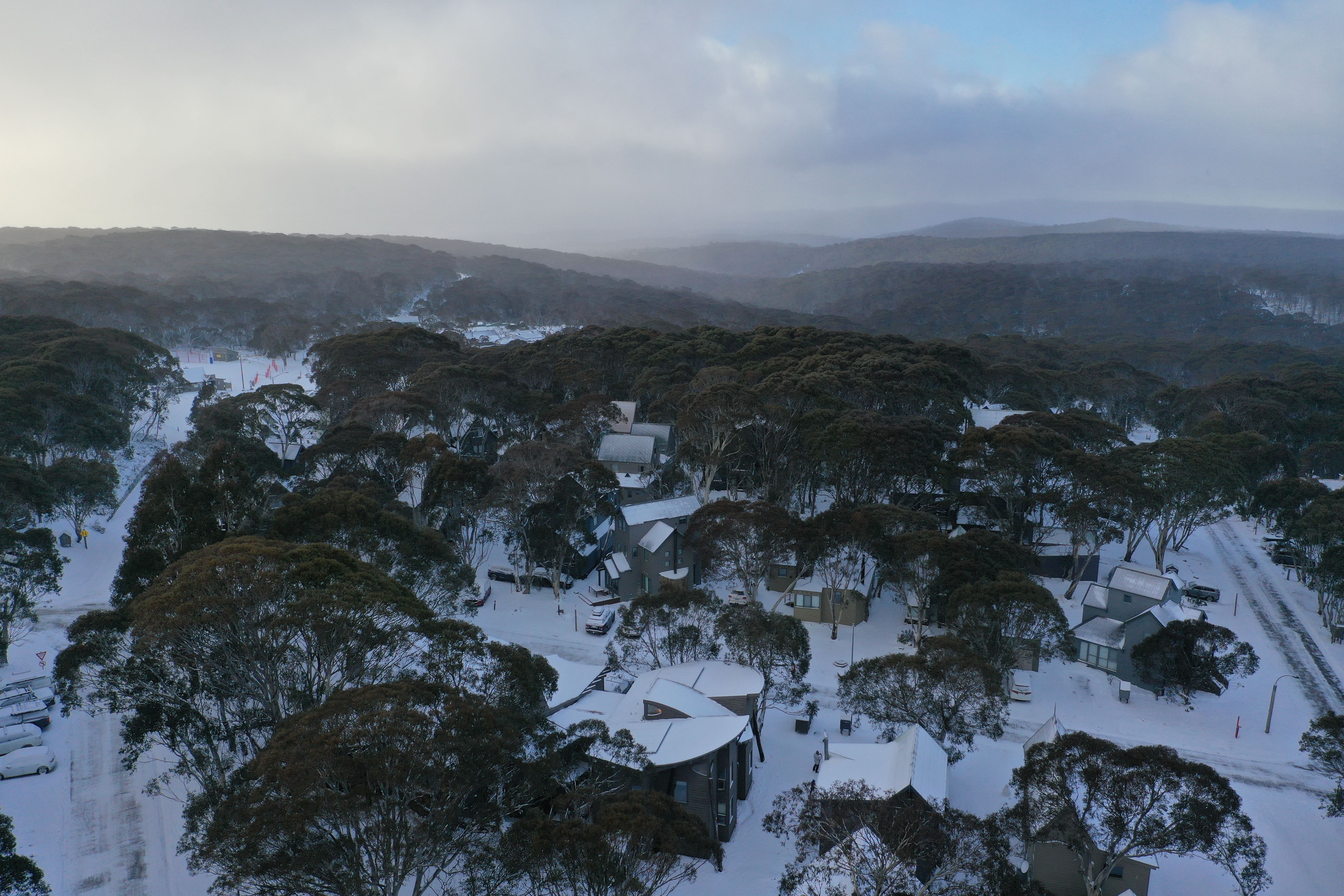 Scenic aerial shot of snow-covered Hotham Heights in Victoria, Australia.