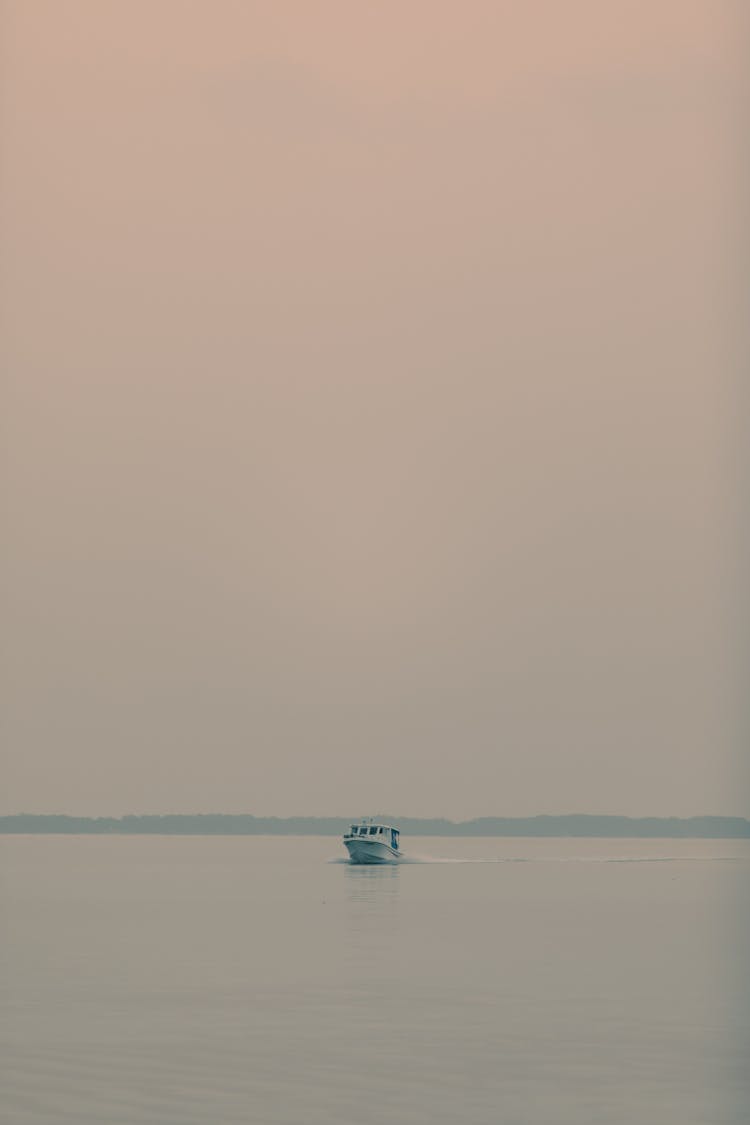 Boat Cruising In The Sea