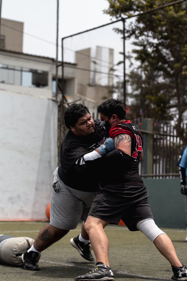 Athletes Fighting On Field