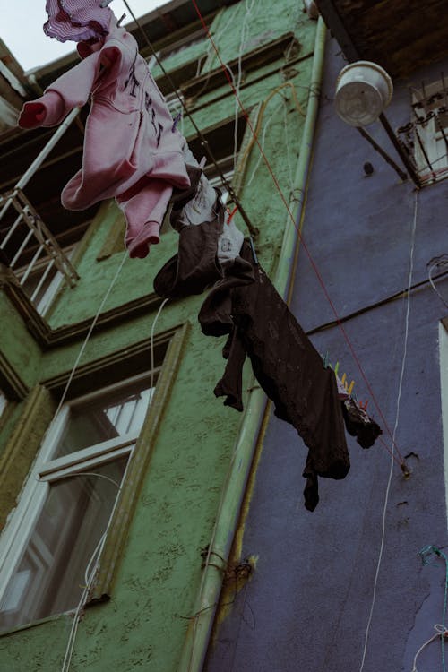 Low Angle Shot of Clothesline with Hanging Fabric