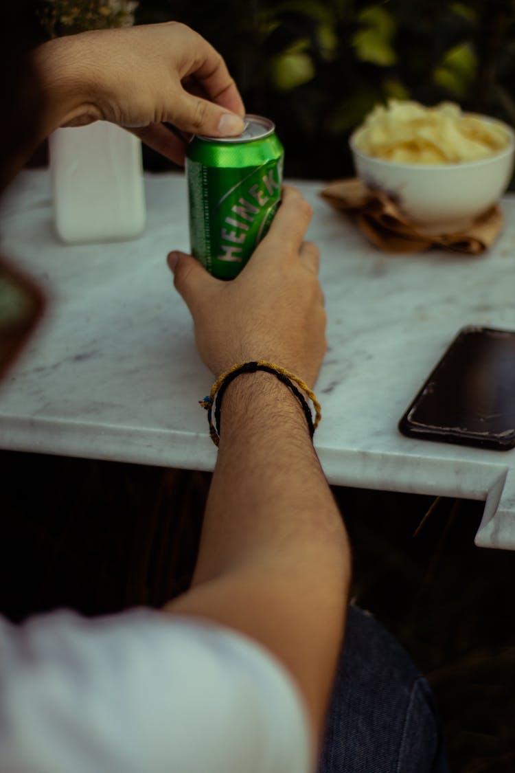 Man Opening A Beer 