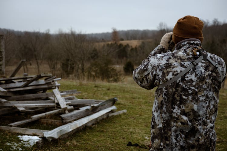 A Hunter Using Binoculars