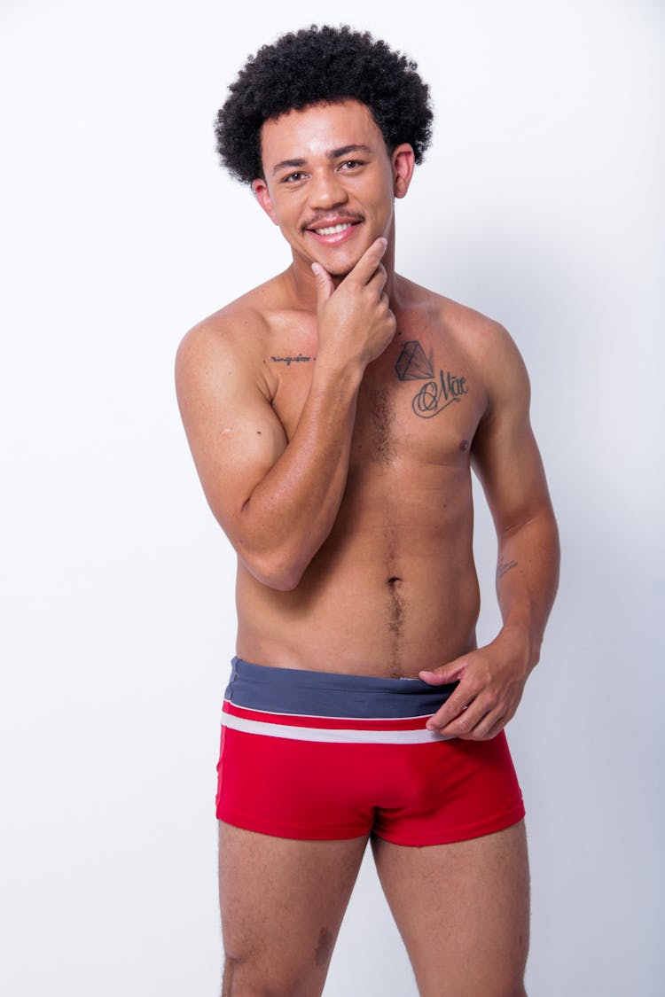 Curly Haired Man Wearing Red Boxer Brief 