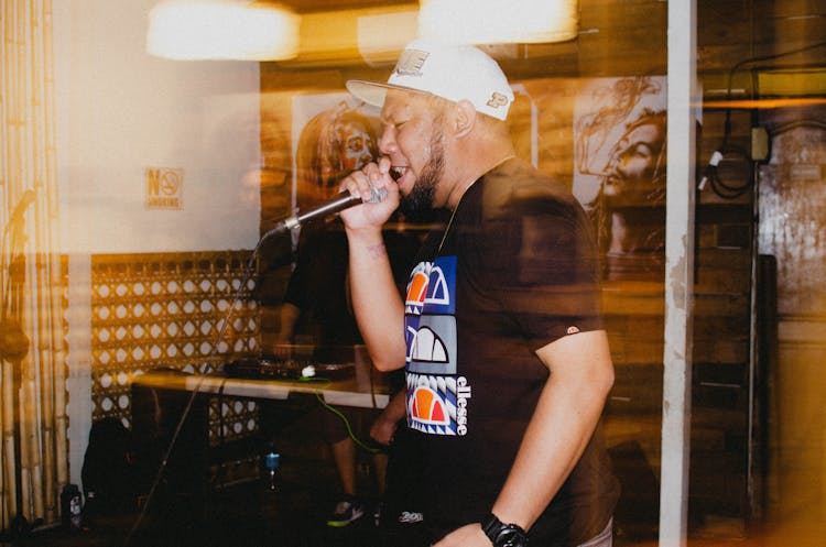 Man Singing In Recording Booth