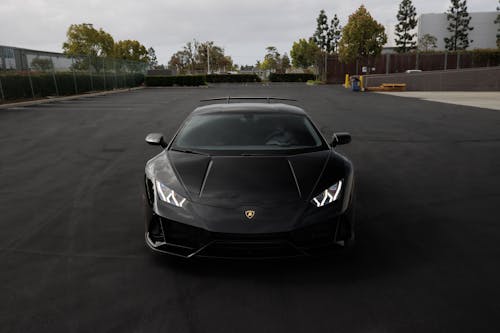 Black Lamborghini Parked on Parking Lot