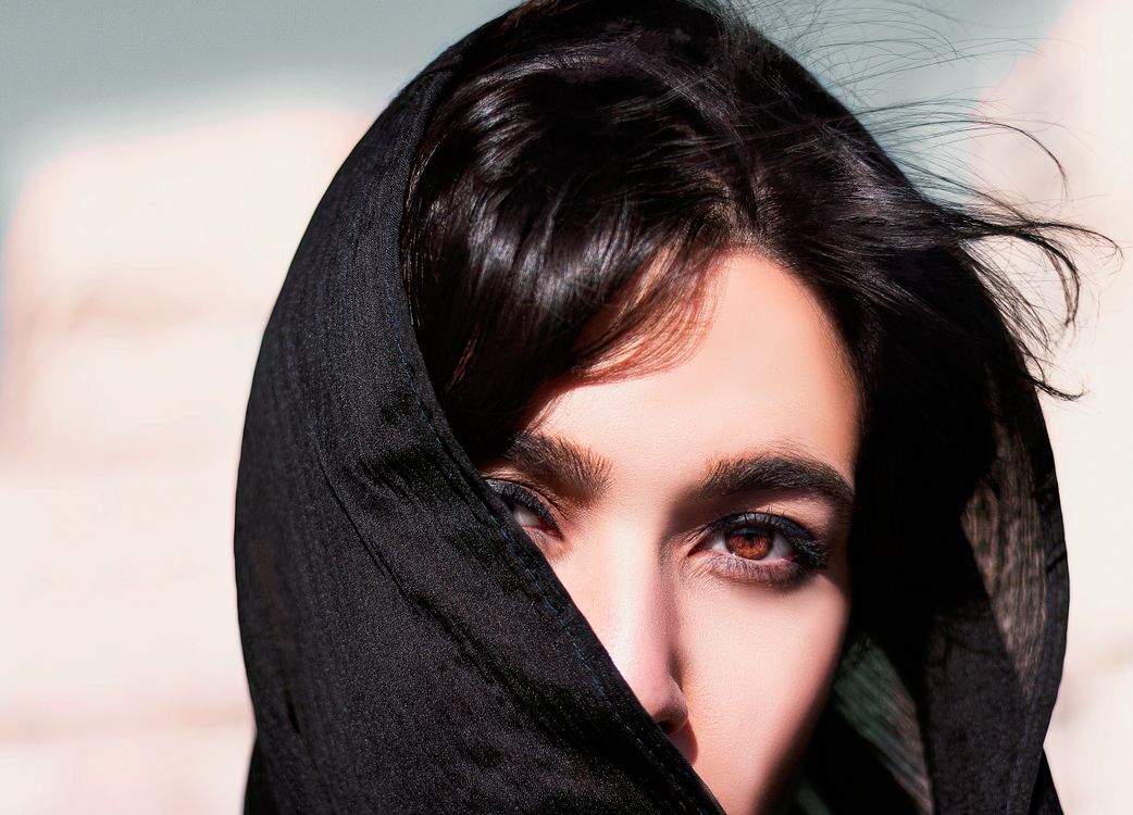 Woman Covering Her Face With Black Scarf · Free Stock Photo