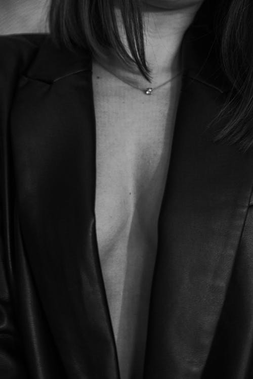 Grayscale Photo of Woman Wearing Black Suit Jacket