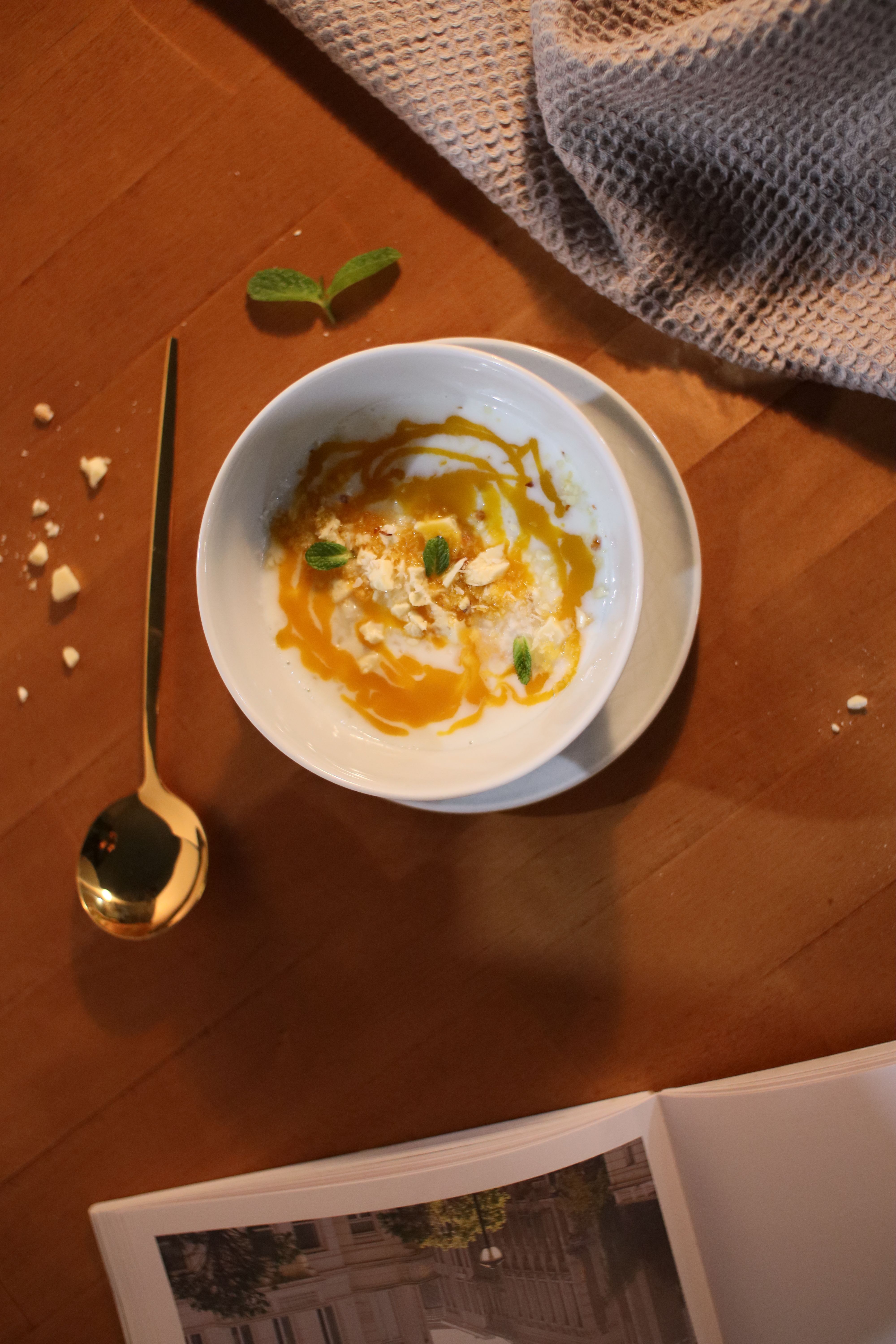 An appetizing bowl of soup with creative styling, captured from above.