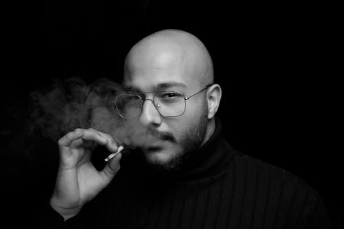 Free Bearded Man Smoking a Cigarette Stock Photo