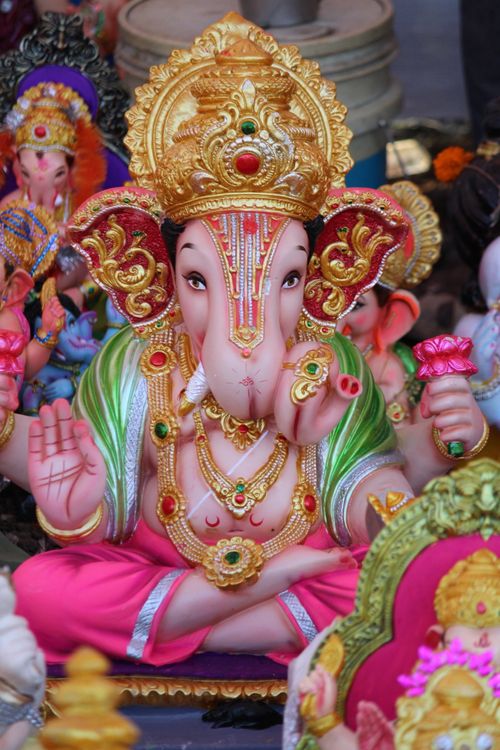 Free Colorful Ganesha statue symbolizing Hindu culture and spirituality. Stock Photo