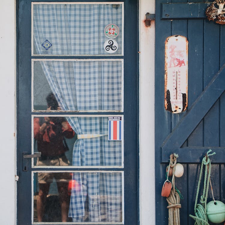 Reflection Of Photographer In House Window