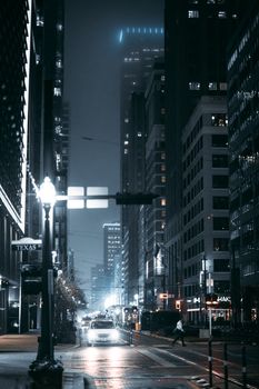 A captivating moody night view of downtown Houston with high-rise buildings and city lights.