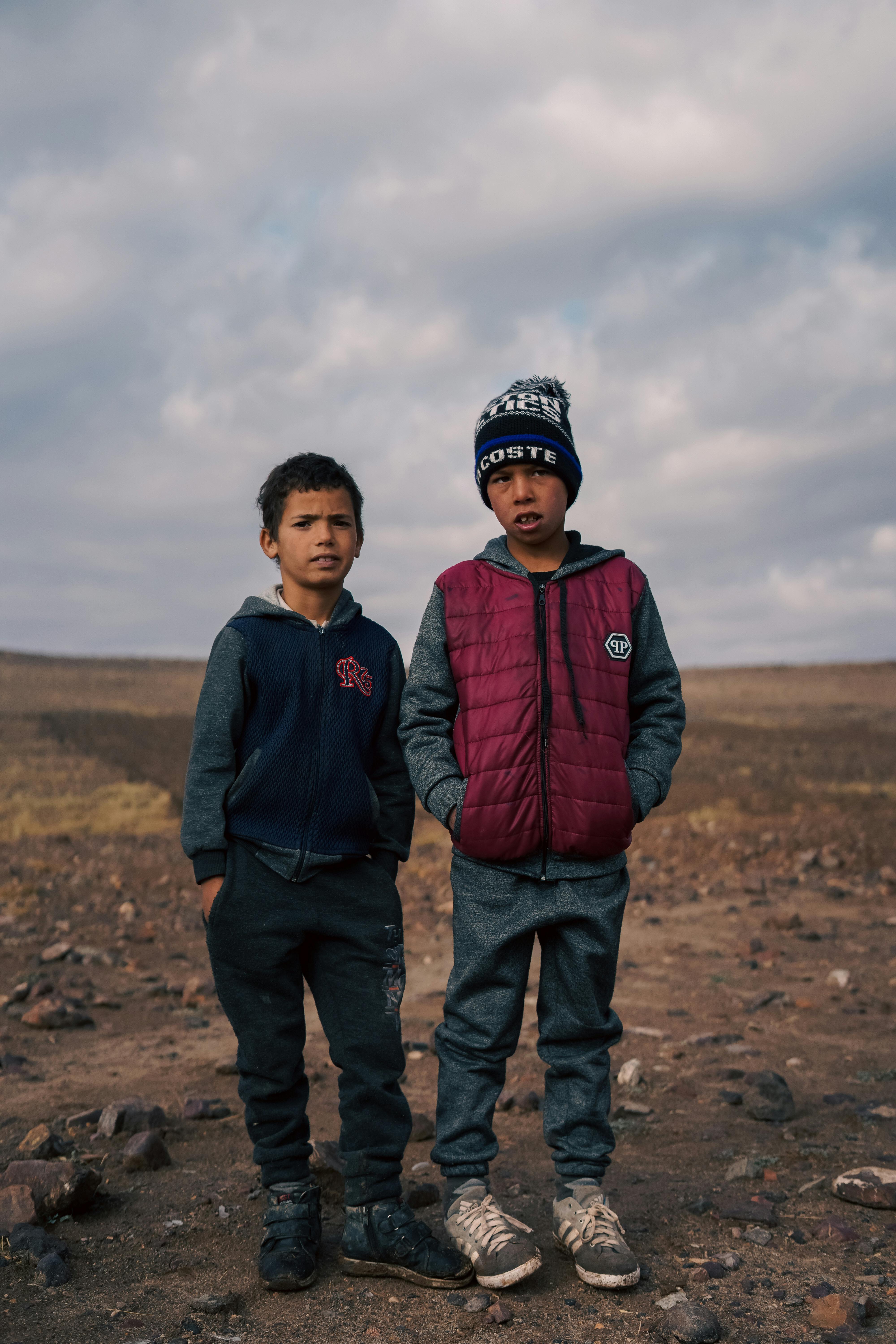 Two Boys Standing Outside · Free Stock Photo