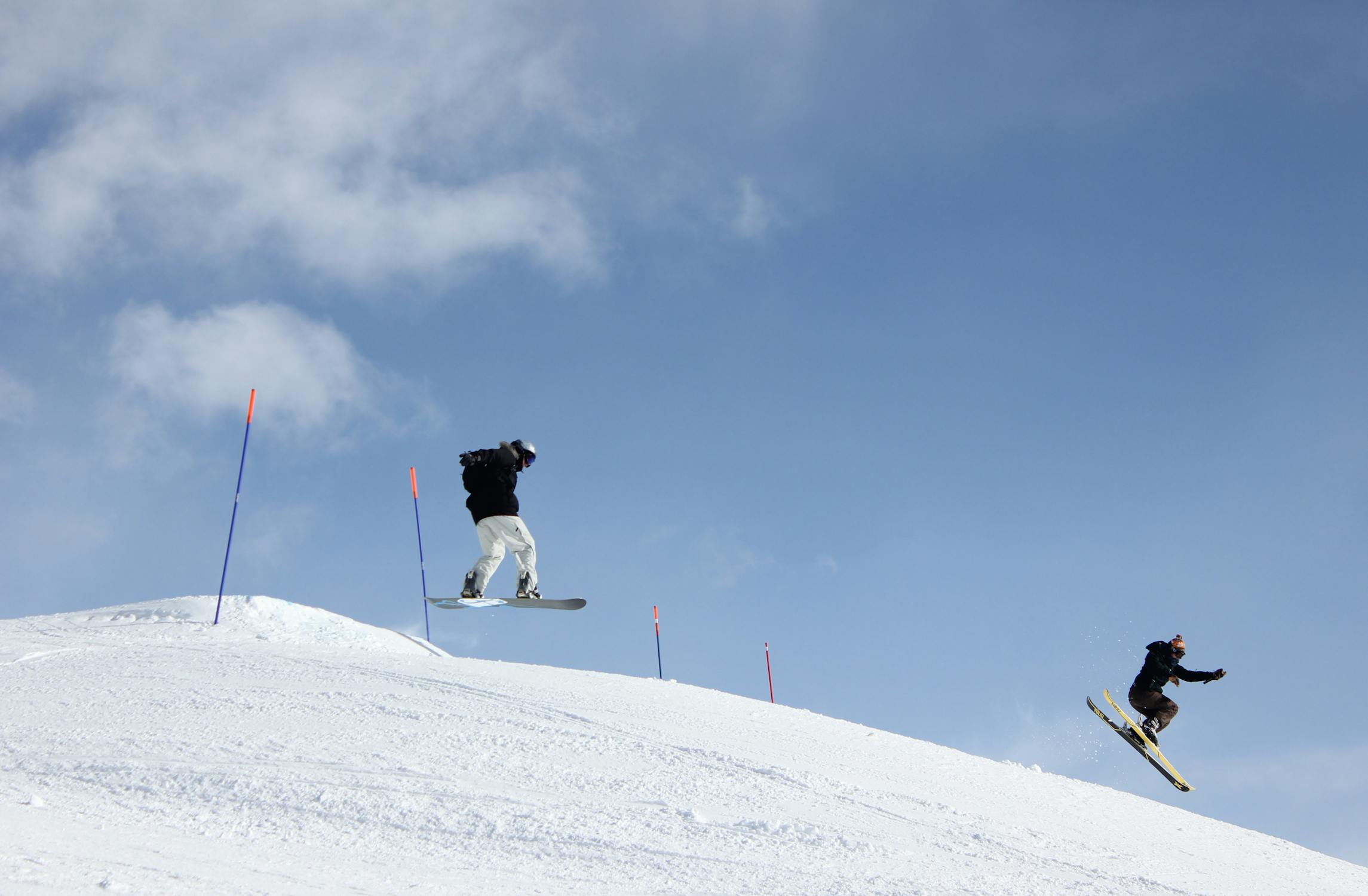 Two snowboarders in one of the French alps ski resorts